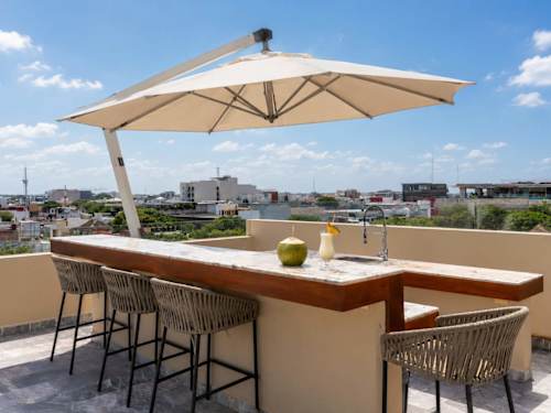 Shared rooftop bar with seating
