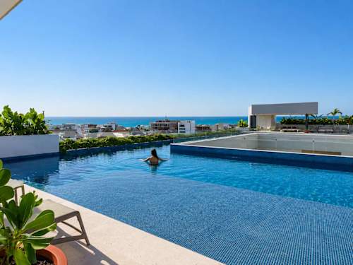 Shared rooftop pool with garden and Caribbean views (communal)