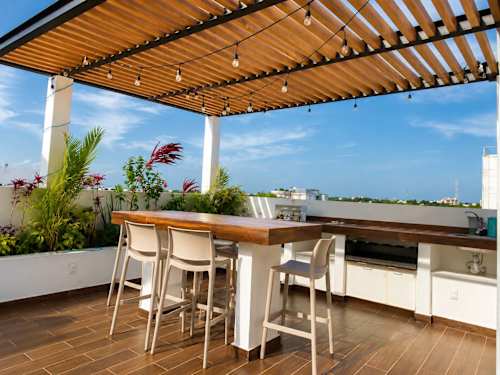 Shared rooftop lounge and bar area