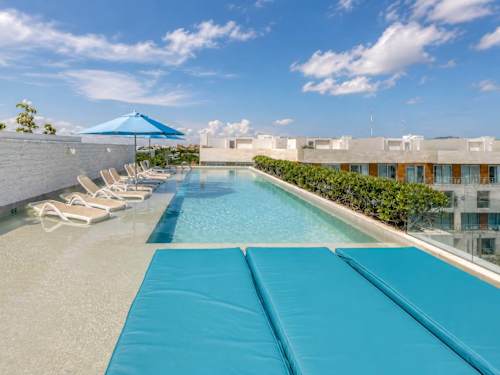 Shared rooftop pool and sundeck (communal)