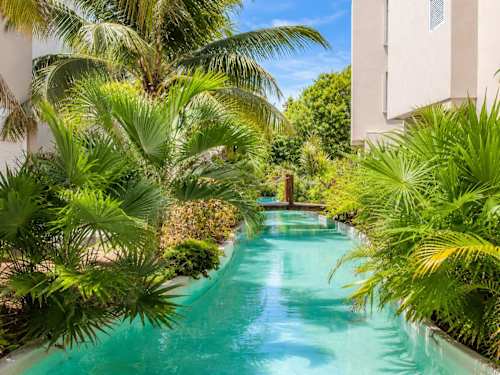 Shared community pool with palapa (common area)