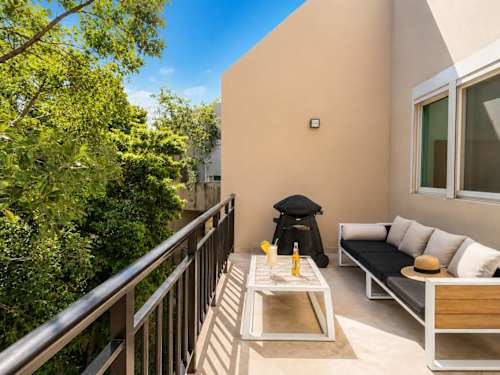 Private terrace with BBQ and outdoor lounge seating