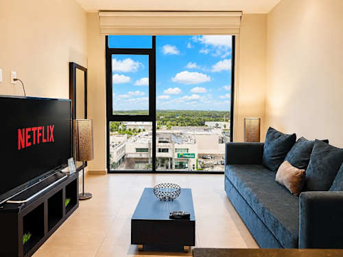 Living room with sofa and balcony view