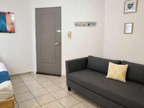 Comfortable living area with a sofa bed, perfect for unwinding or hosting extra guests