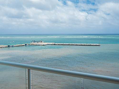 3BR beachfront apartment in Puerto Morelos featuring a rooftop pool
