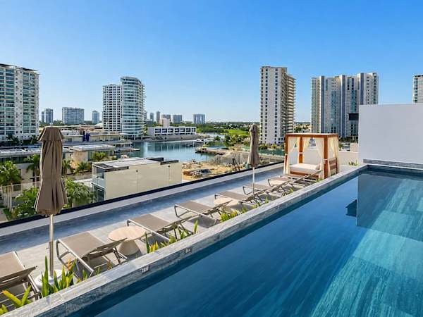 Luxury 3BR in Puerto Cancun | Rooftop Pool & Gym