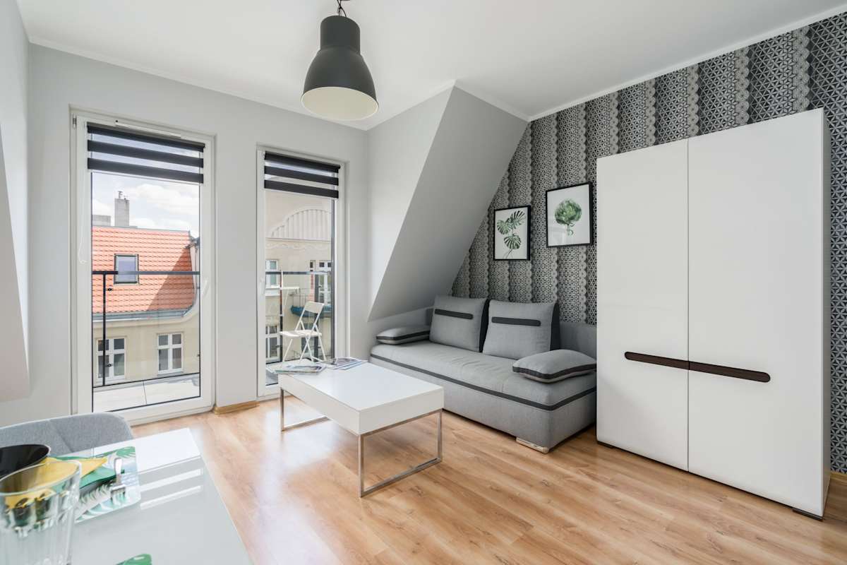 Różana 19 Poznań | Grey Apartment with Parking Near MTP