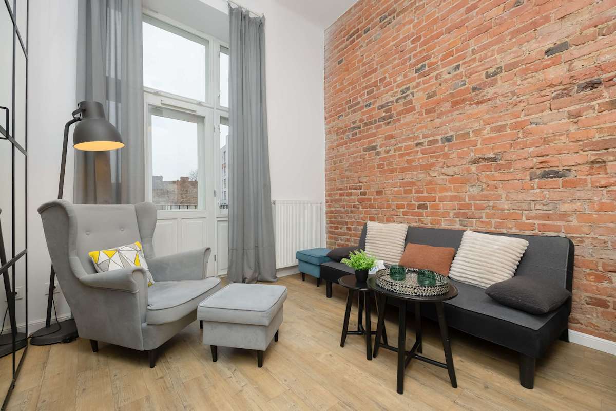 Stylish Apartment with Mezzanine & Balcony 500 m to the Underground Station by Noclegi Renters — Warszawa, Mazovia — vacation rental