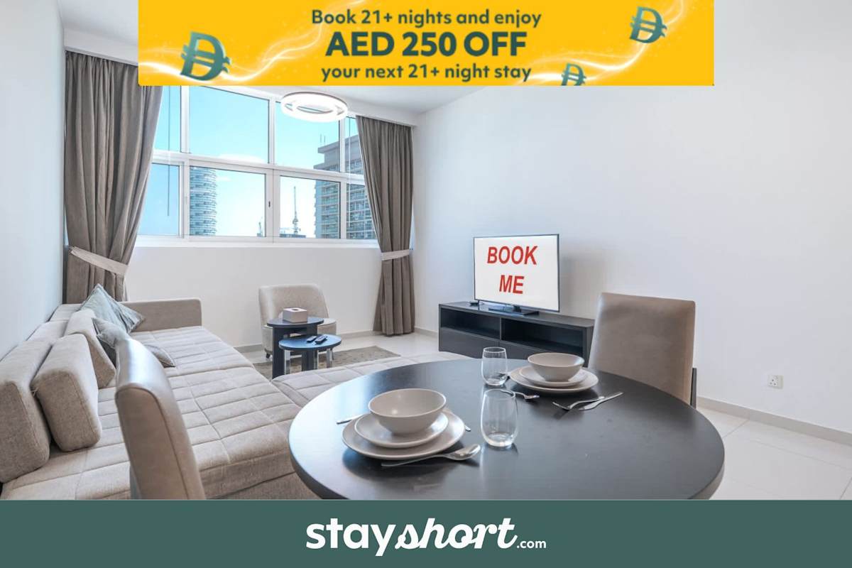 StayShort - 1BR JVC Apartment with Balcony & Modern Interiors
