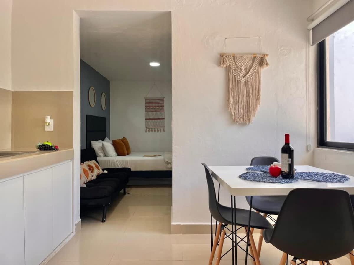 Dining area with seating and kitchenette