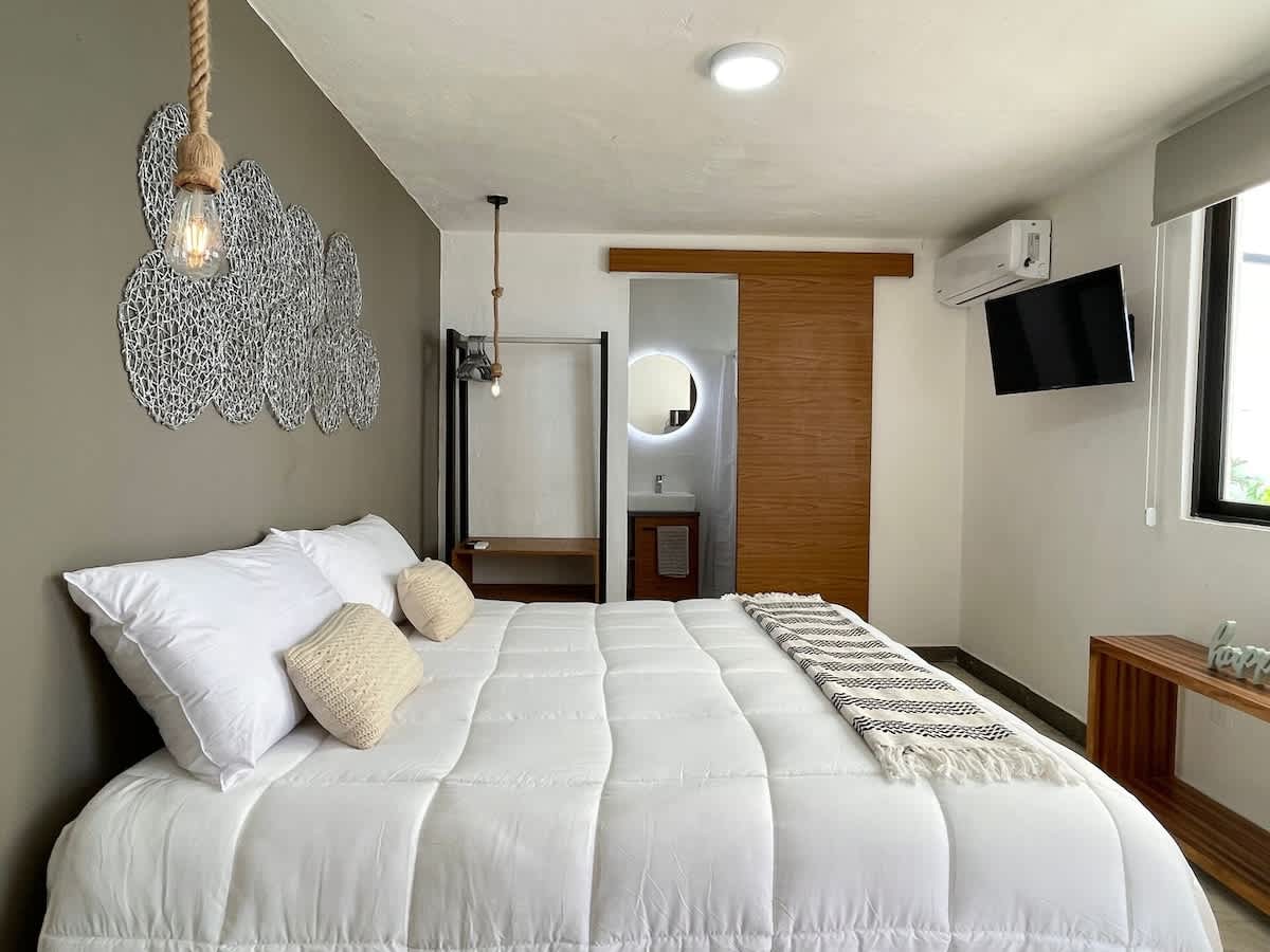 Spacious King bed in a bright bedroom