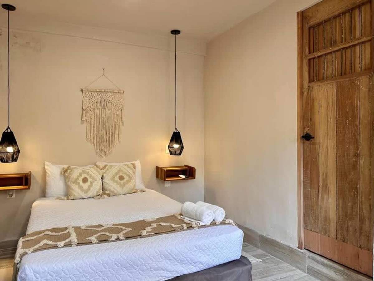 Studio sleeping area with double bed.
