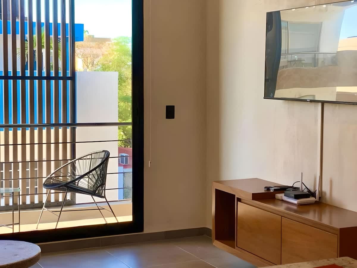 Living room and balcony with city view