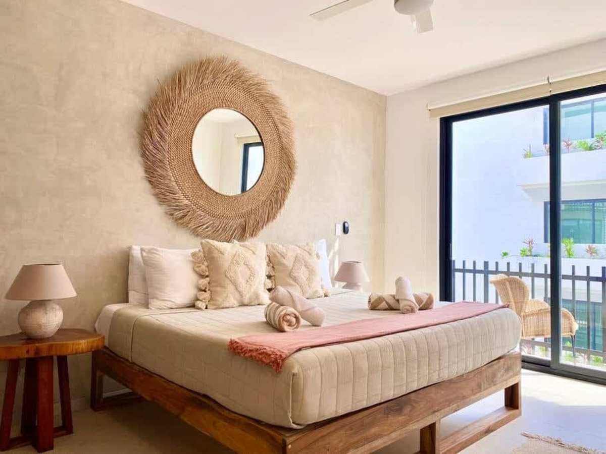 Bedroom with king bed, ceiling fan, AC and smart TV