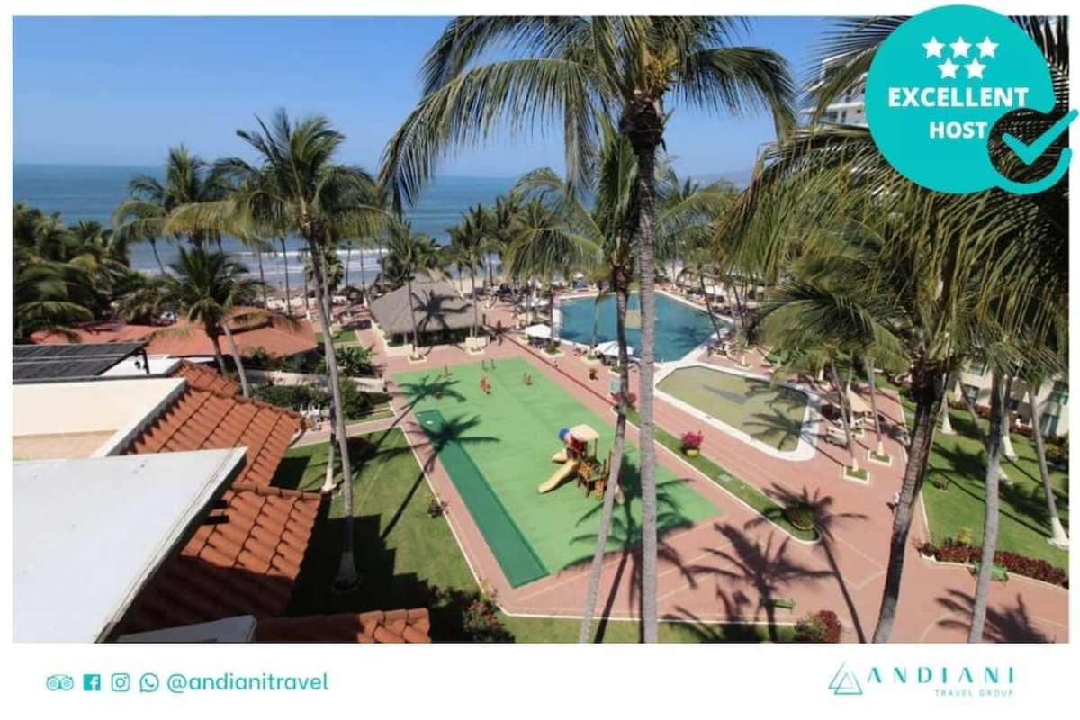 Resort grounds with shared pools and beach access