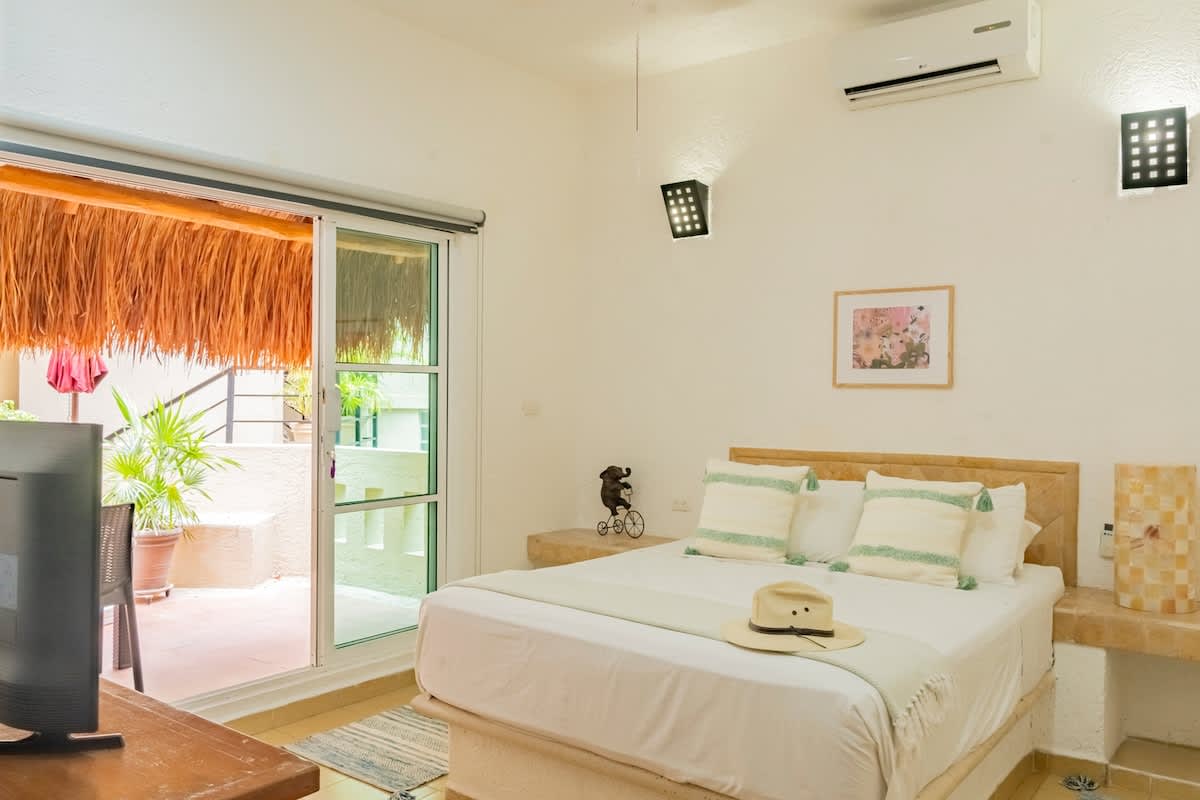 Bright bedroom with queen-size bed
