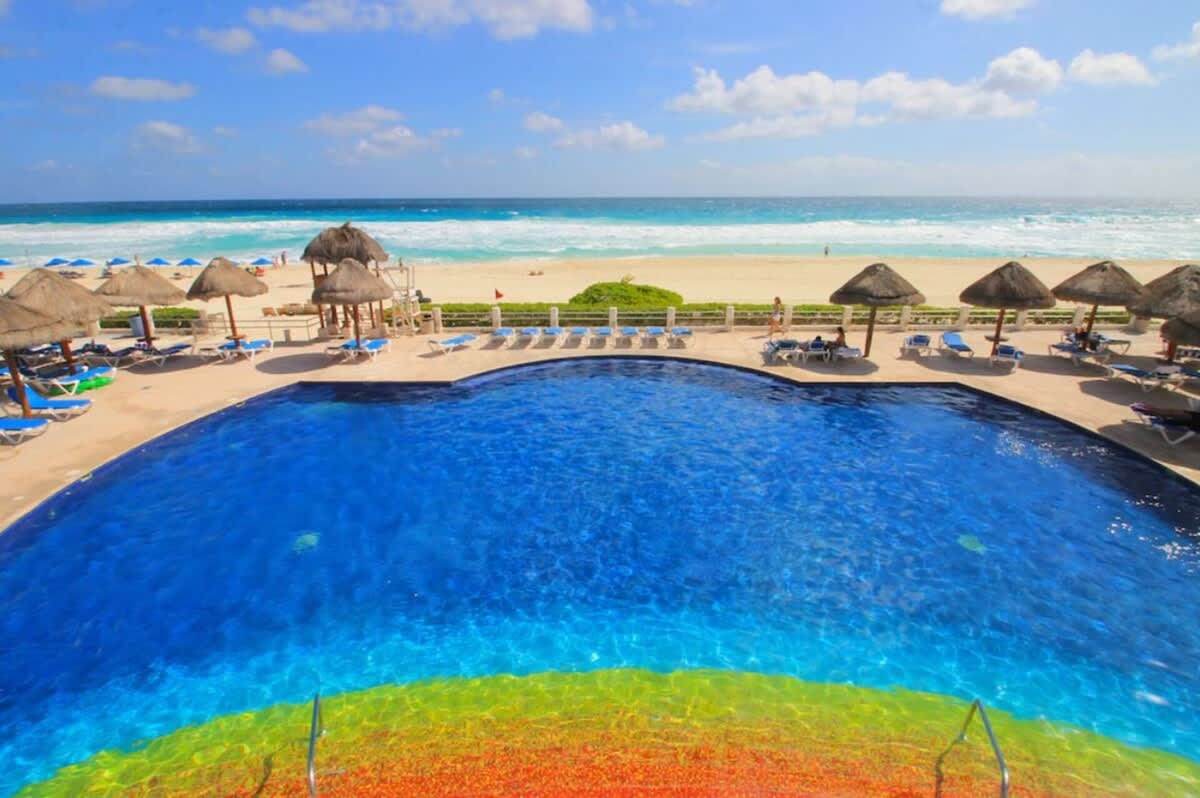 Communal pool area with loungers (aerial view)
