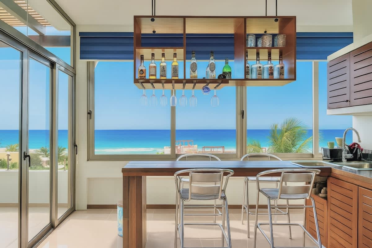 Rooftop sun terrace with pergola and panoramic Caribbean views