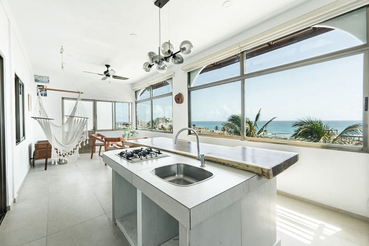 Open kitchen and living area with sea view