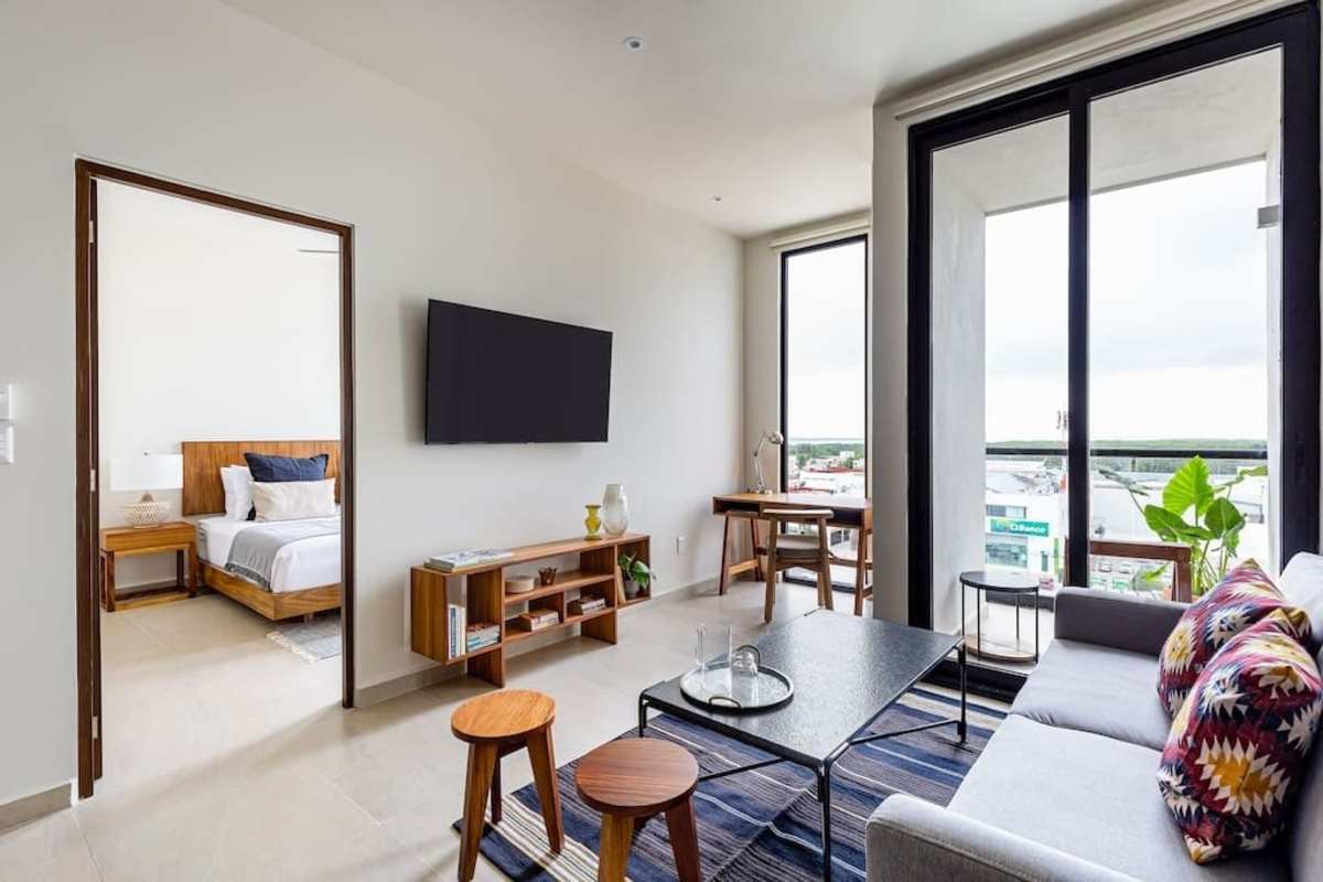 Living room with private balcony and lagoon view
