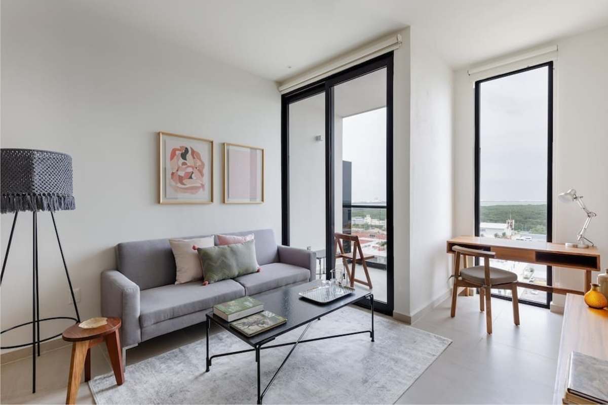 Living area with lagoon-view balcony