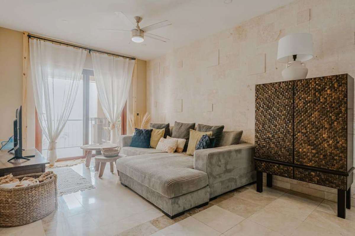 Living room opening to the private terrace
