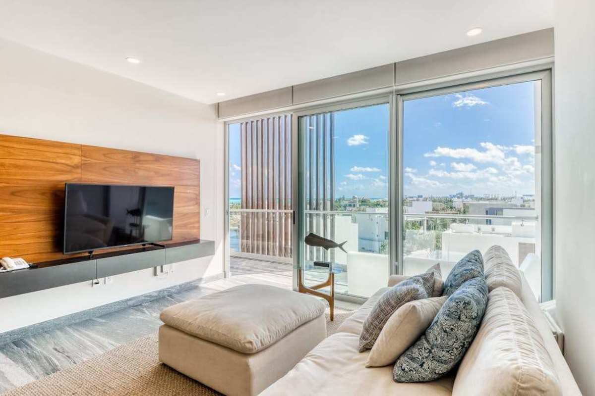 Bedroom with ocean view, smart TV and private balcony