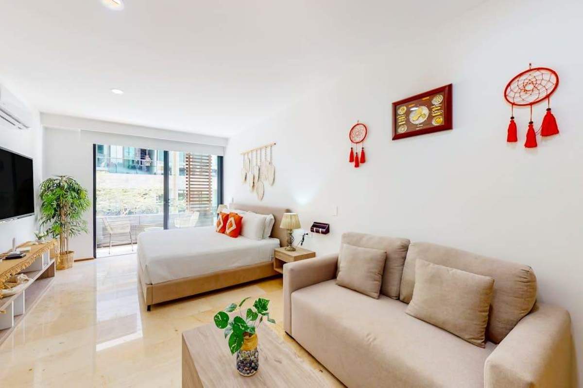 Living room with comfortable sofa and smart TV