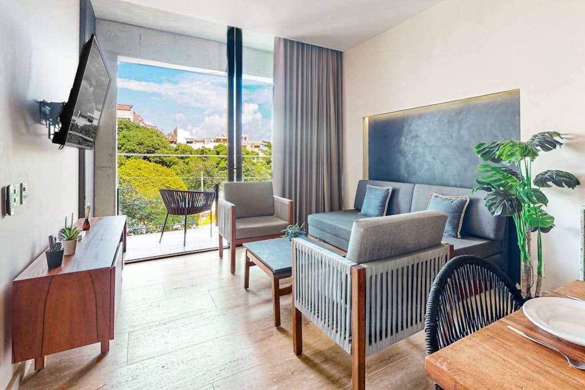 Living area with balcony access and view