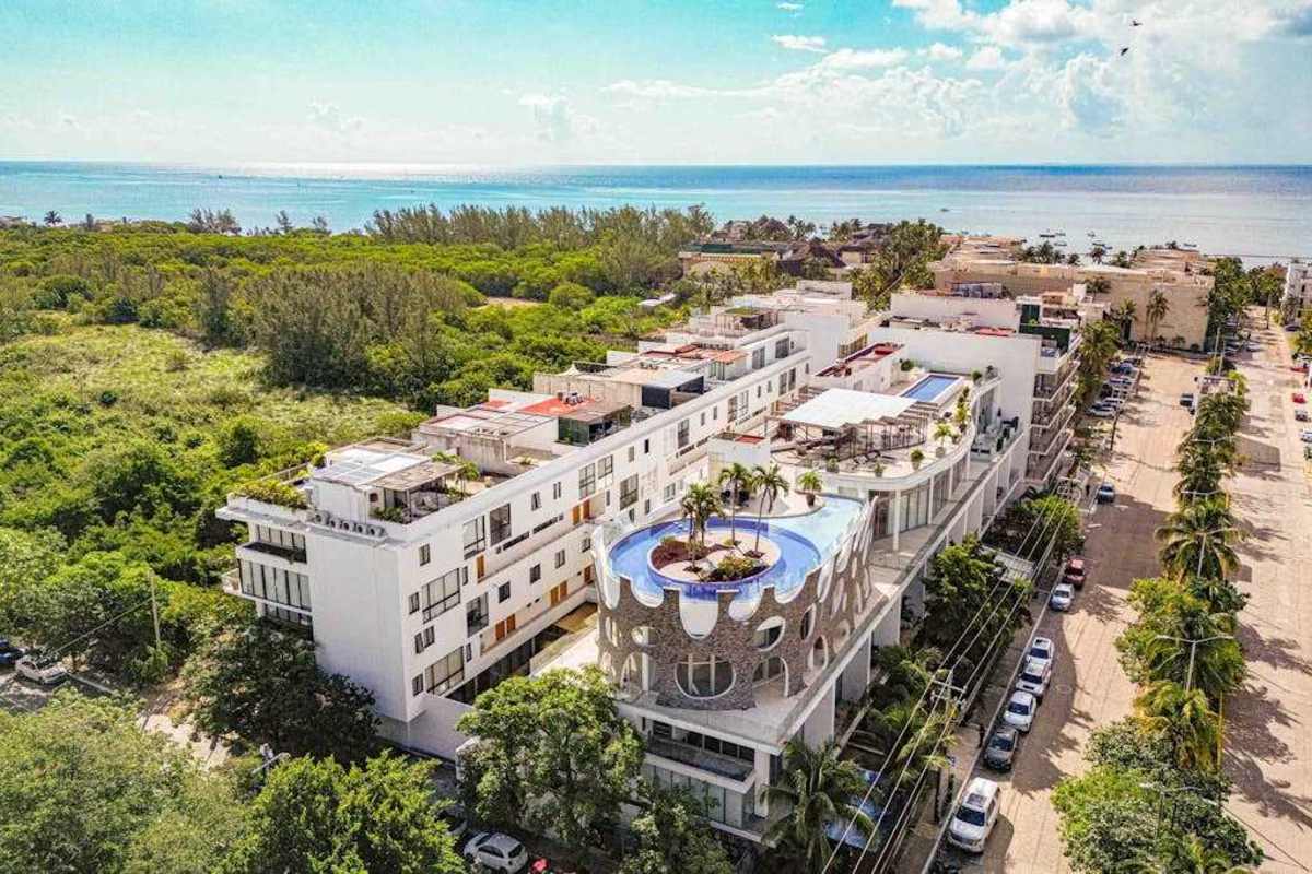 Aerial view of the low-rise resort community, moments from the beach and Fifth Avenue in the heart of Playa del Carmen