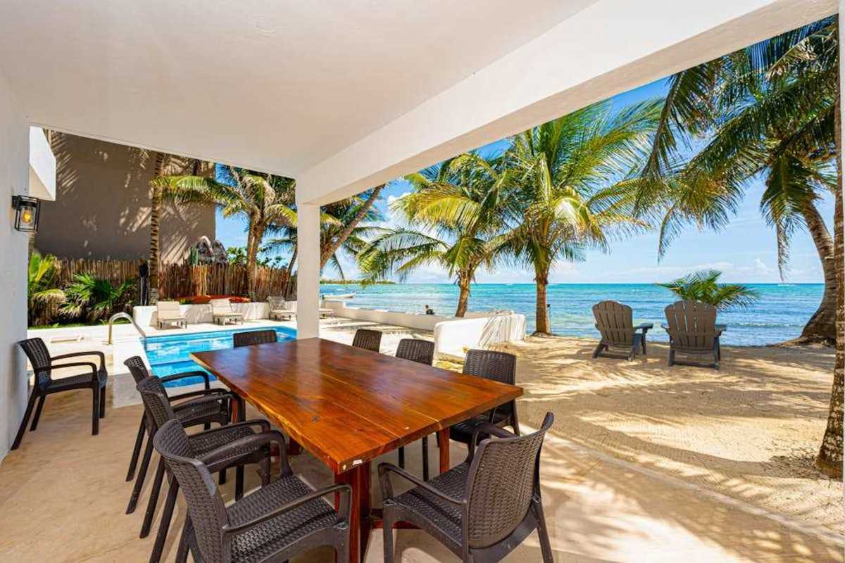 Covered beachfront terrace with ocean views