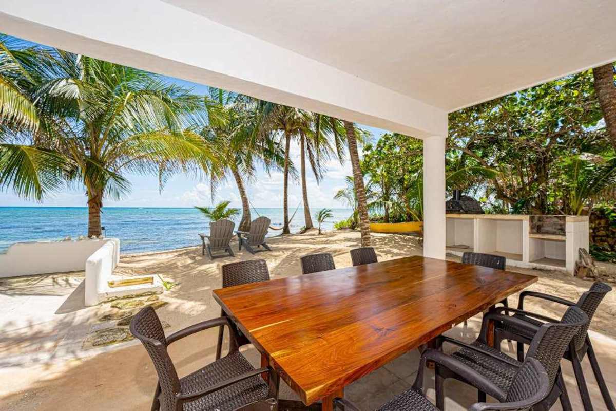 Oceanfront terrace dining beside the private pool
