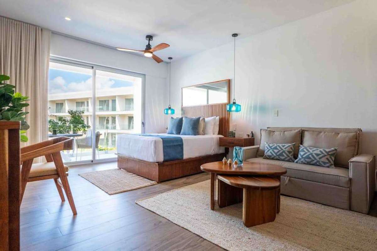 Open-plan living area with sofa and Smart TV