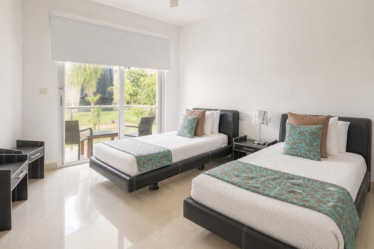Studio interior with two twin beds
