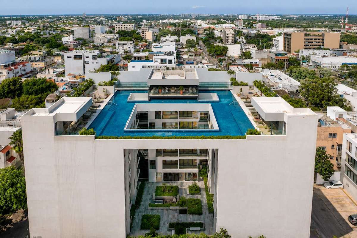 Aerial view of the Ceiba 25 building and its shared rooftop pool (communal)