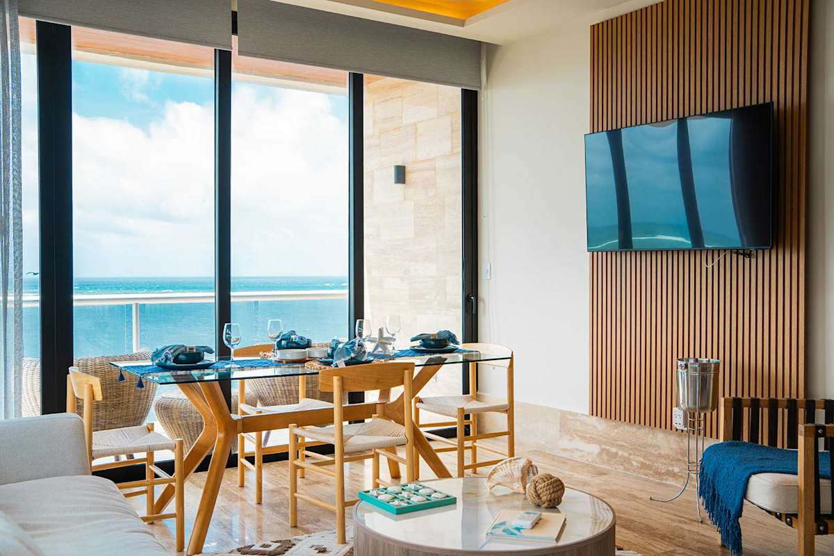 Spacious 3BR beachfront retreat | rooftop pool gym