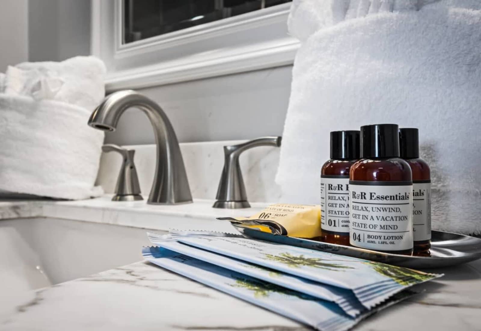 Pamper yourself with our R&R Essentials toiletries, expertly curated to enhance your relaxation. Featuring conditioning shampoo, shower gel, and more, each product promises a luxurious experience to leave you refreshed and in a perfect vacation state