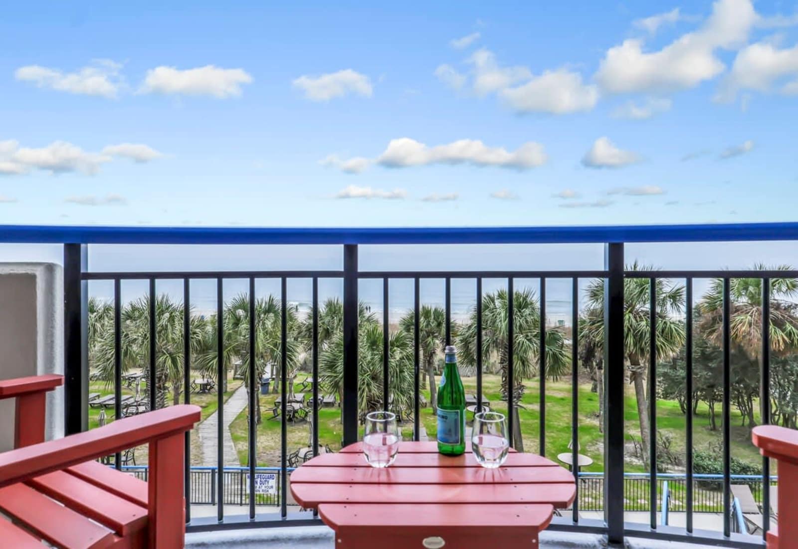 Morning coffee or sunset sips? Your private balcony has front-row seats to palm-lined paths, ocean breezes, and serious vacation vibes—cheers to making memories with a view! 