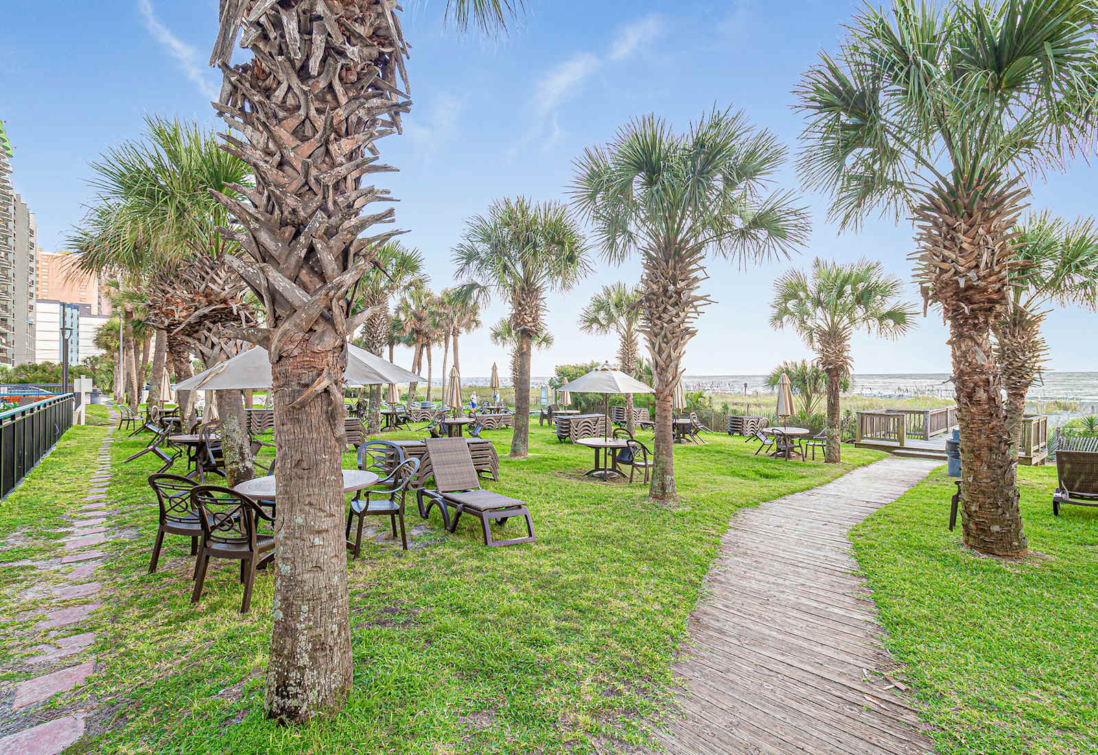 Sip, sun, and stroll! This palm-lined paradise is your backyard—perfect for morning coffee, lazy afternoons, or a sunset walk straight to the beach.