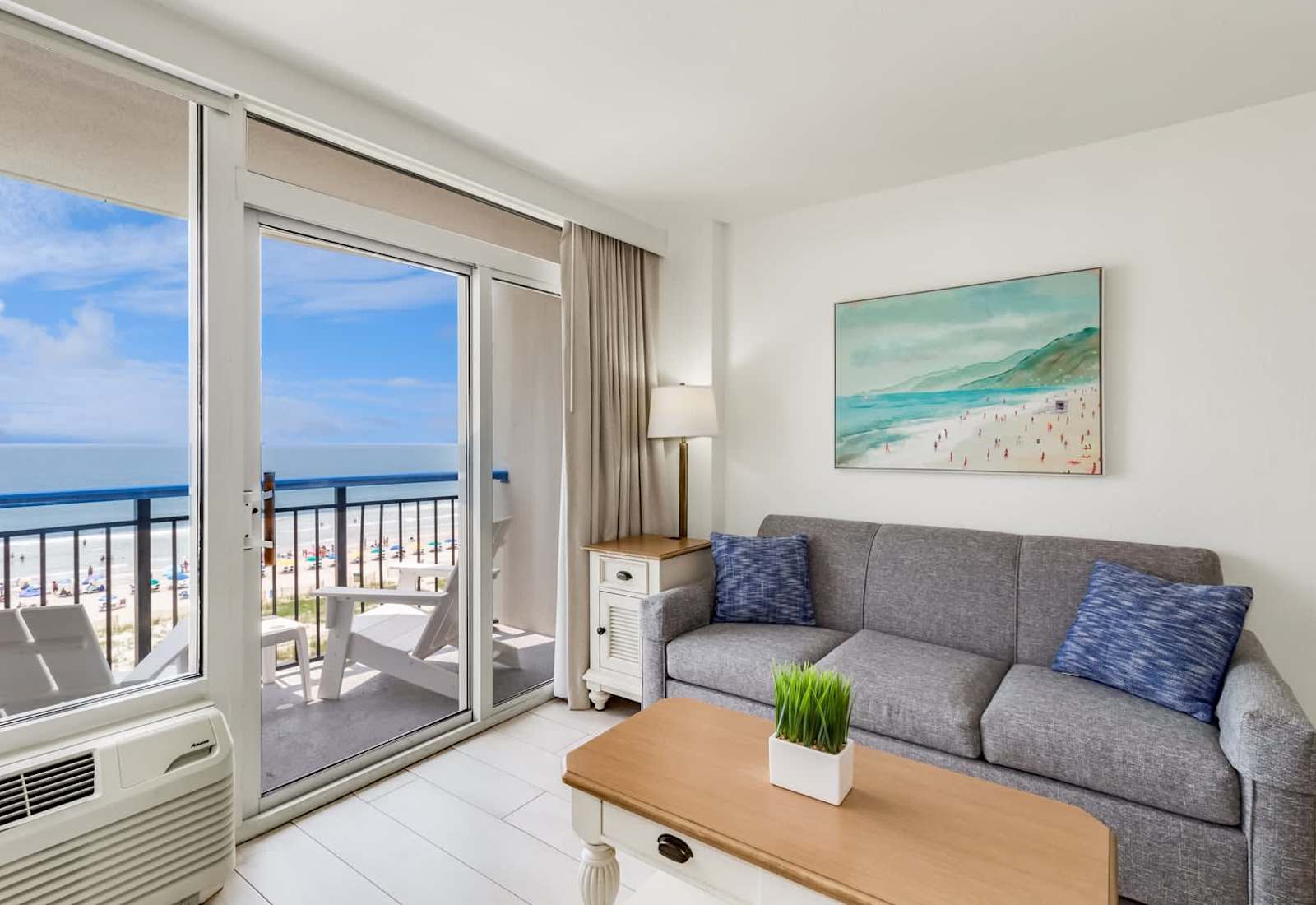 Wake up to postcard views and unwind with the sea breeze in your bright and beachy oceanfront living room—where the couch is comfy, the vibes are coastal, and the Atlantic is always center stage.