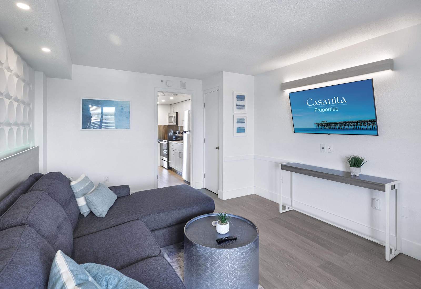 Relax and unwind in this spacious living area with comfortable seating and a large flat-screen TV
