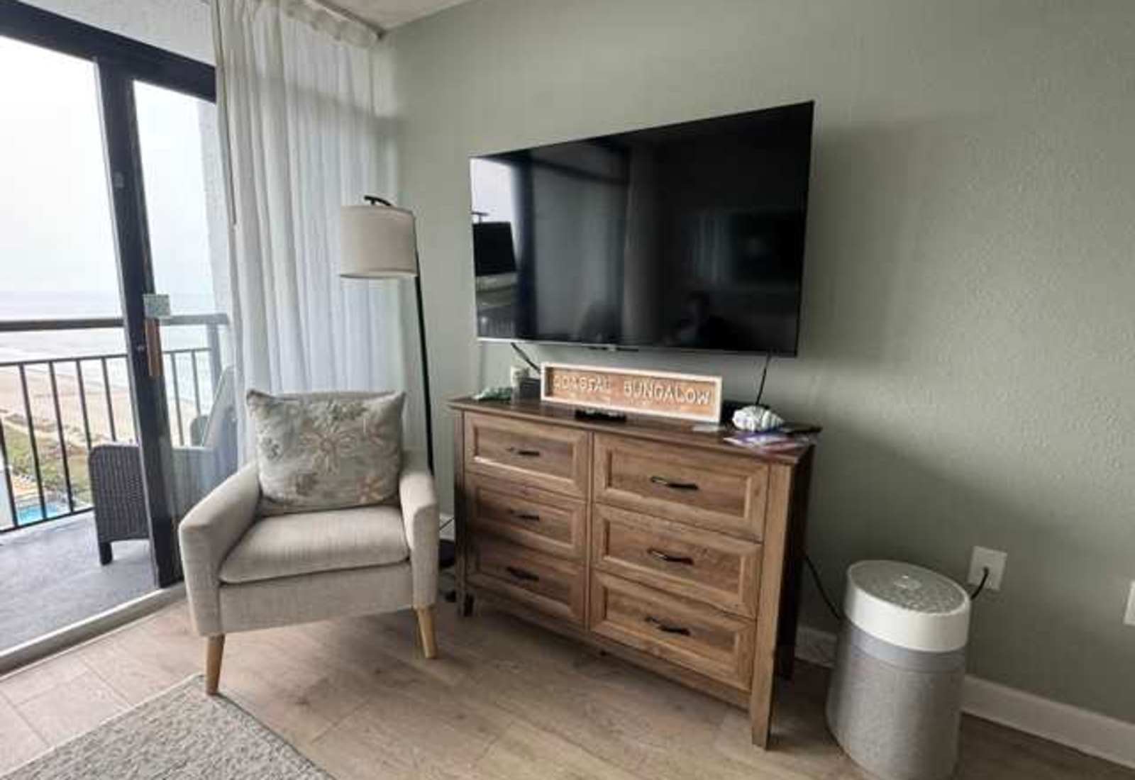 Relax in coastal comfort with this ocean-view suite featuring a smart TV, and a breezy open layout—just steps away from the beach. Perfect for streaming, lounging, and soaking up seaside vibes!