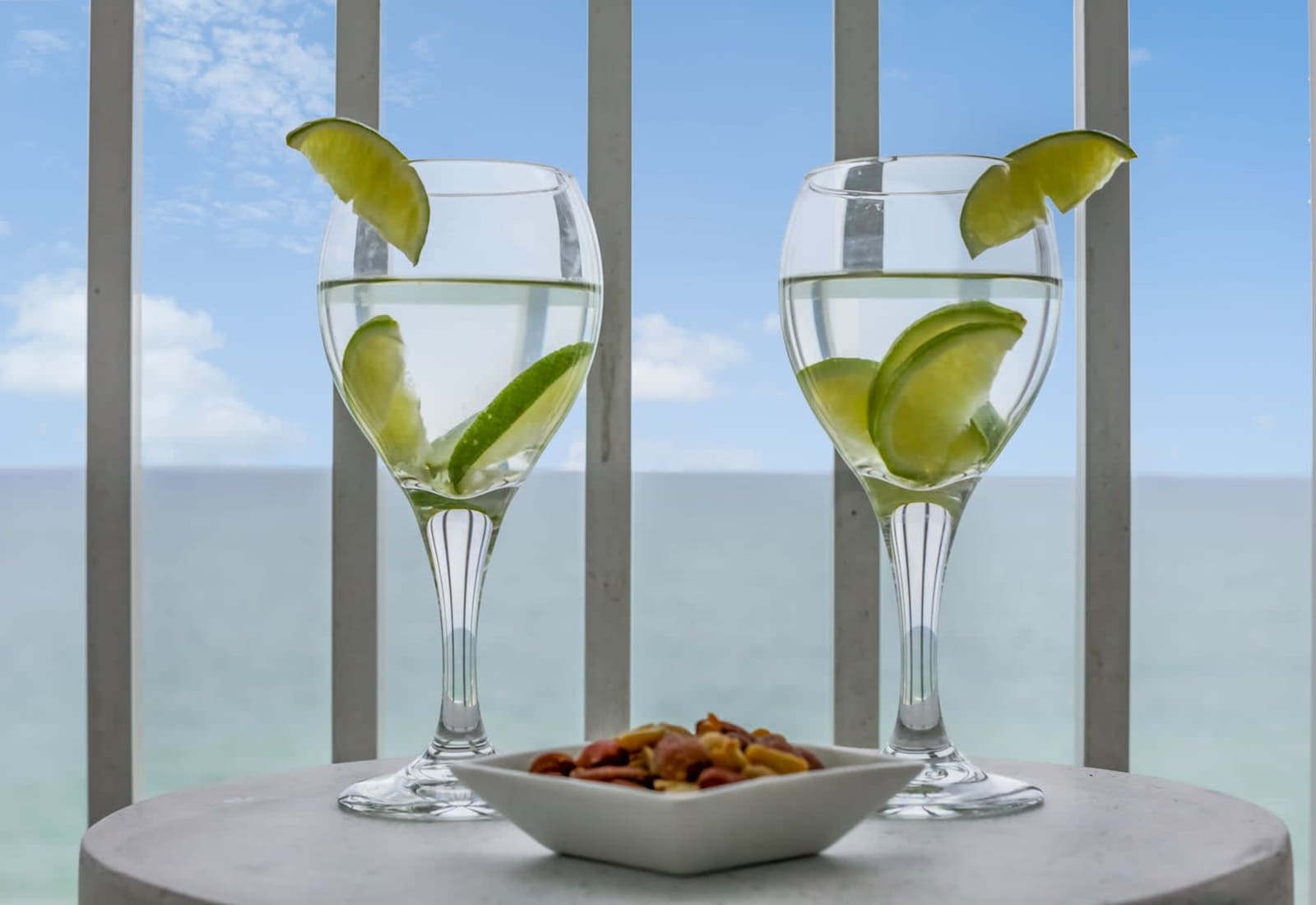 Indulge in refreshing drinks and light bites as you take in stunning ocean views from your private balcony. The perfect spot to relax, unwind, and create unforgettable seaside memories!