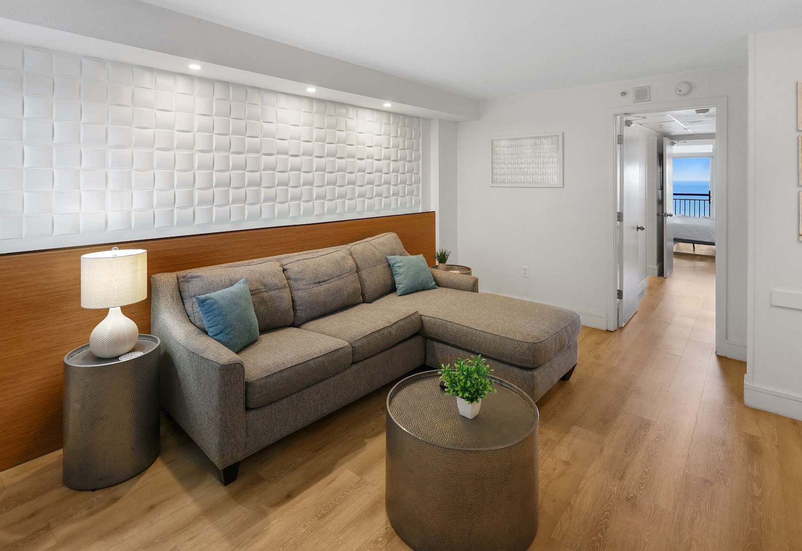 Relax and unwind in this spacious and inviting living room. The comfortable seating & stylish décor create the perfect atmosphere for a cozy evening in.