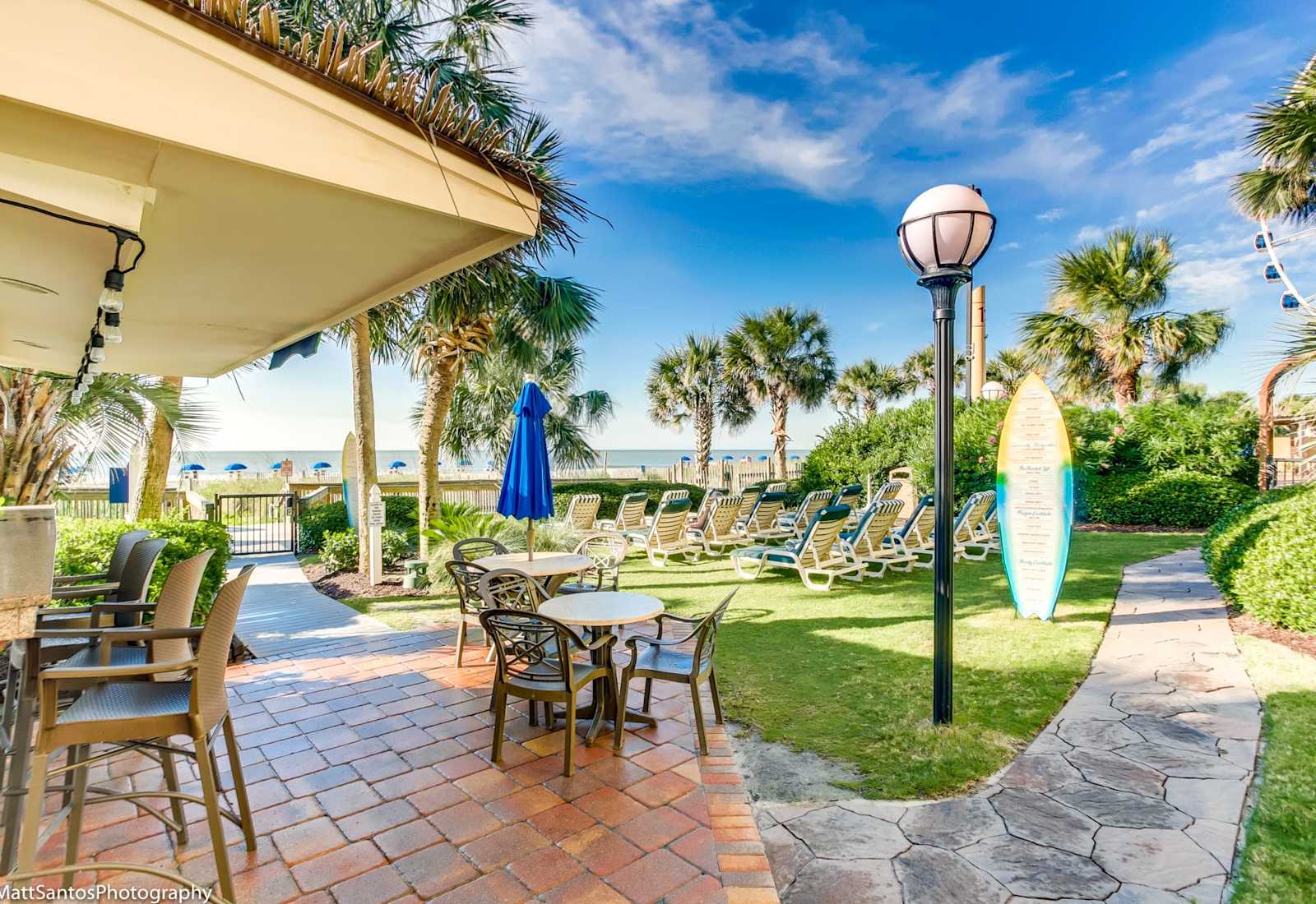 Enjoy oceanfront dining outdoor, perfect for a casual meal with a view.

