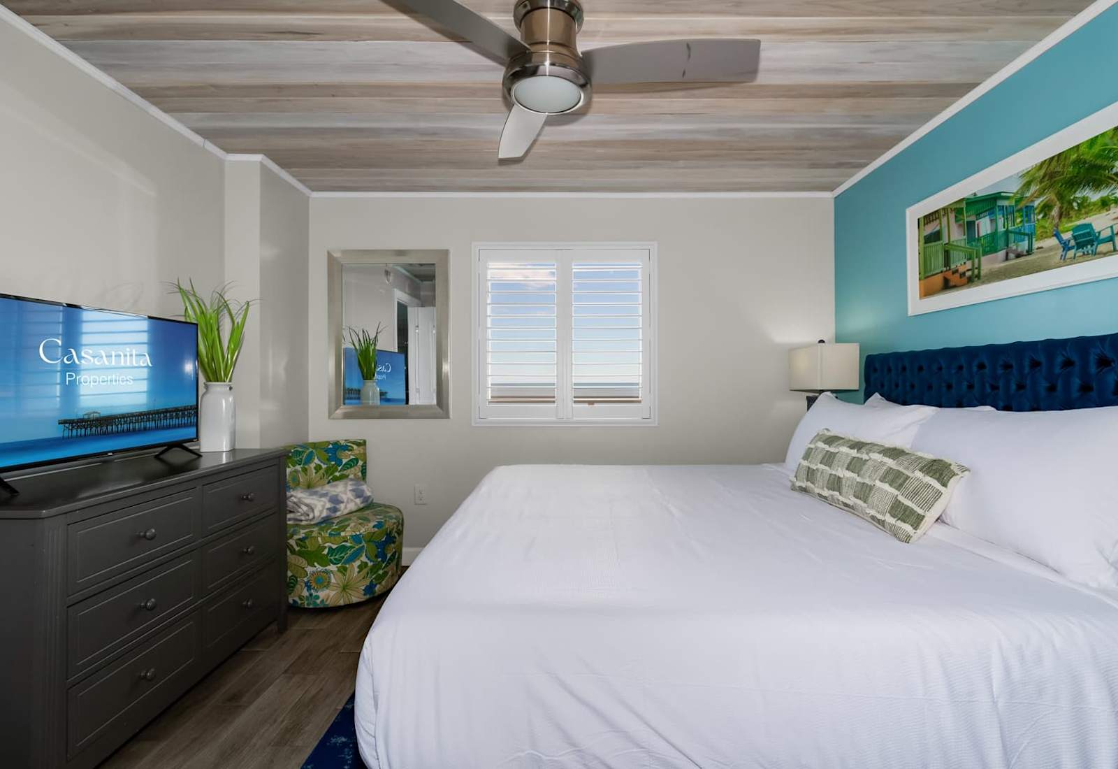 Retreat to this tranquil bedroom oasis, complete with a plush bed, modern furnishings, and soothing coastal decor. With its serene ambiance and touches of elegance, this space promises restful nights and refreshing mornings by the beach.
