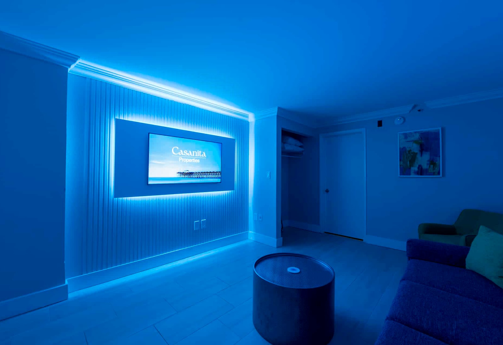 Relax in a modern and stylish room with customizable mood lighting.
