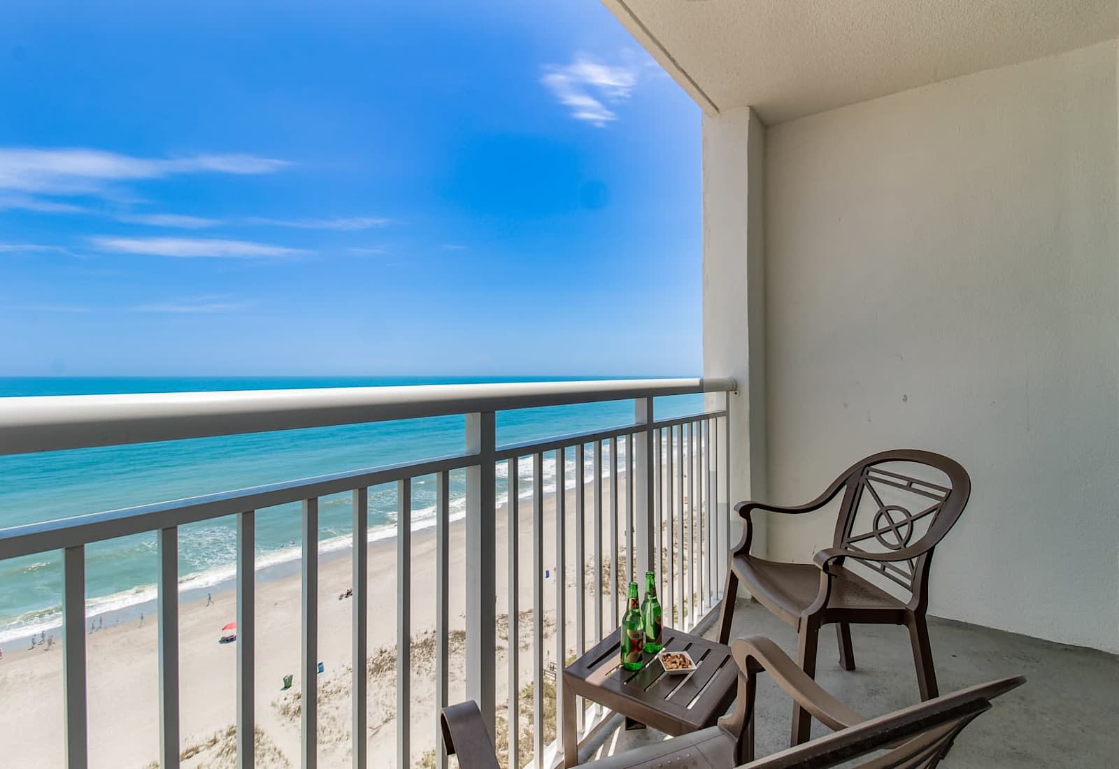 Enjoy breathtaking ocean views from your private balcony, just steps from the sandy beach. Perfect for relaxing mornings and sunset strolls. 