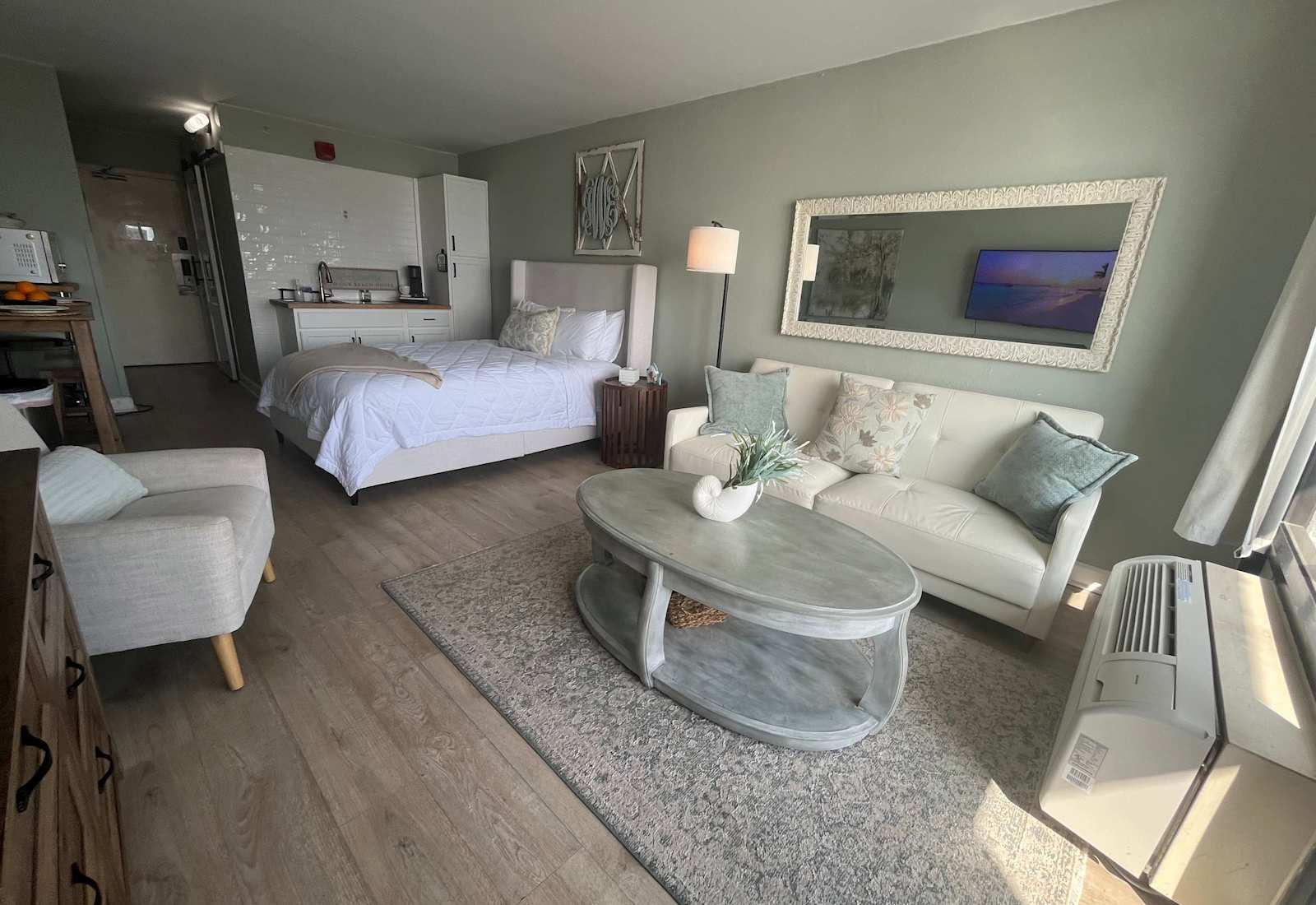 Thoughtfully curated studio layout seamlessly blending a comfortable living area and sleeping quarters