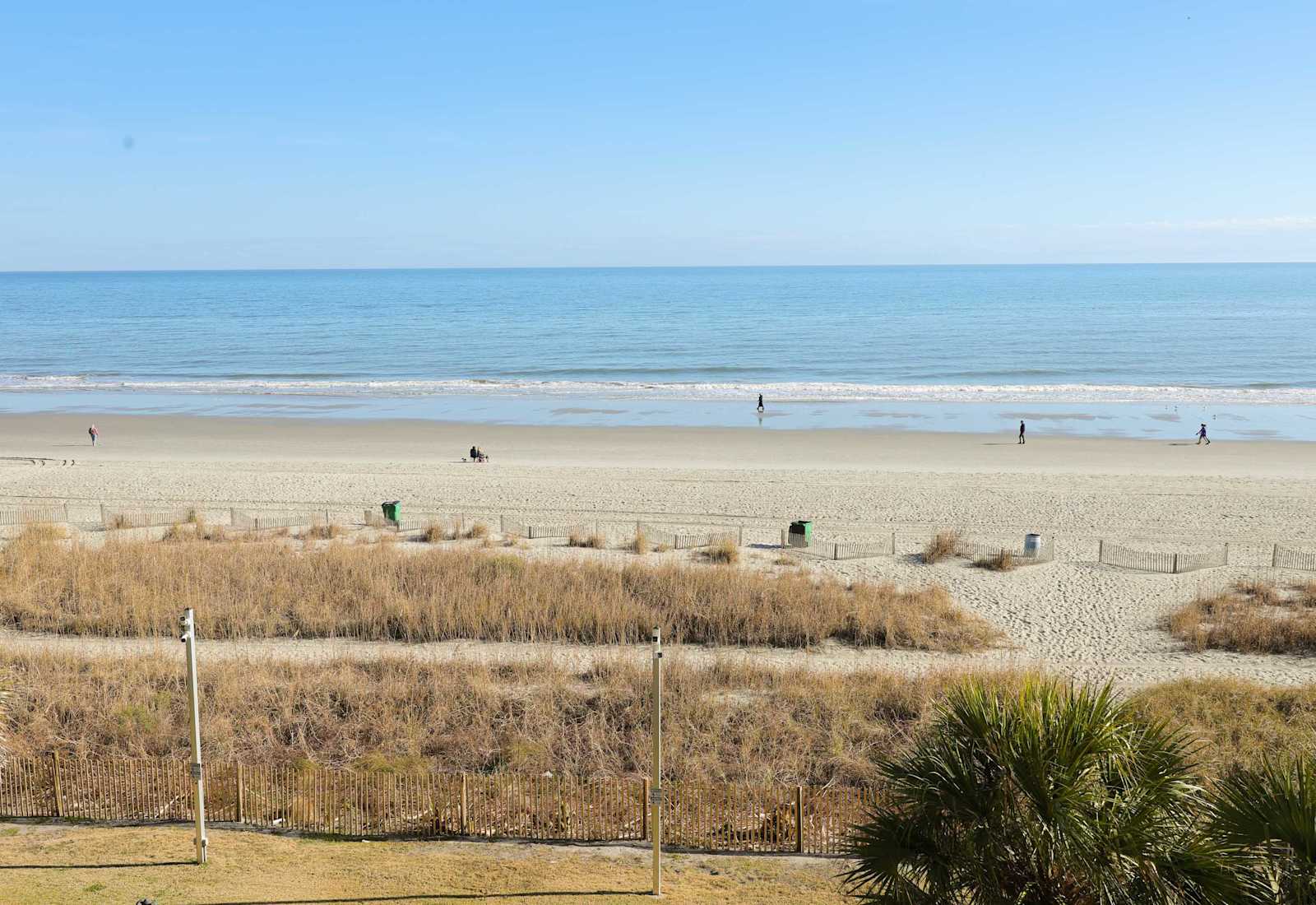 Take in panoramic ocean views from your private balcony, just steps from your bed!
